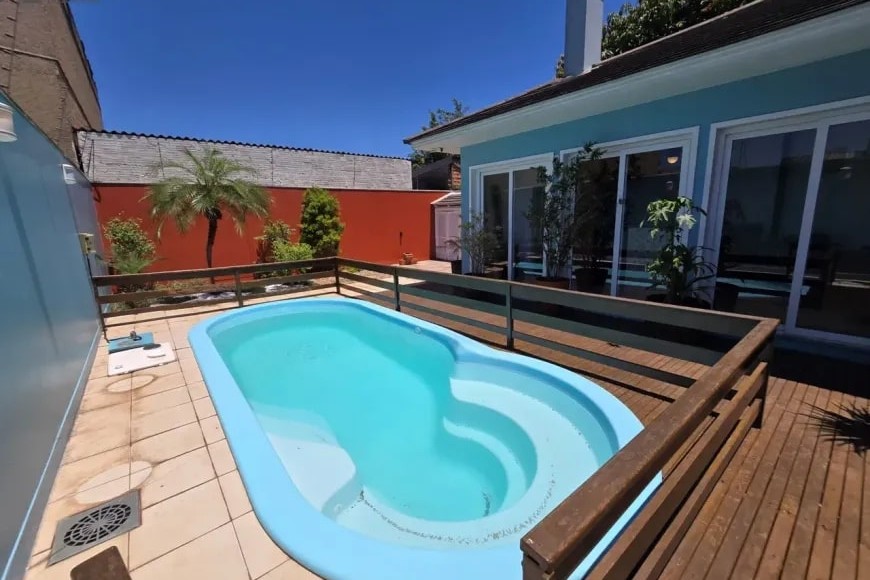 Casa Alto Padrão à Venda em Esteio com 3 Quartos e 4 banheiros à Venda, 338 m²